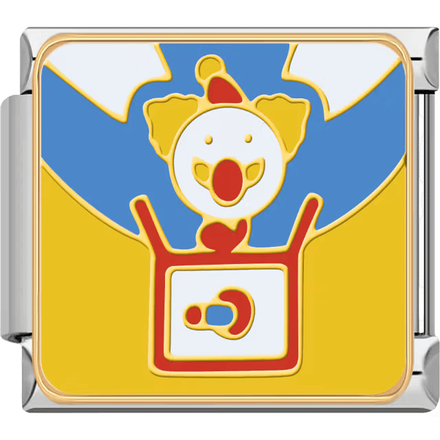 A playful clown springing out of a yellow jack-in-the-box, detailed in red and blue, framed in a silver Italian charm.